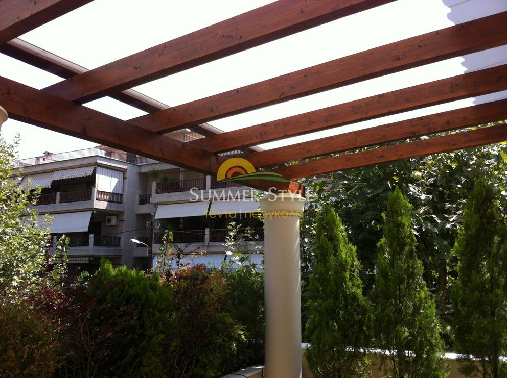 Ξύλινη πέργκολα με κασέτα pergola 8800 Markilux ανοιγοκλειόμενη.